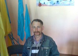 Володимир Майборода за презентаційним столиком Уманського НУС  й науково-практичного журналу "Новини Садівництва"( http://nowsad.com)
